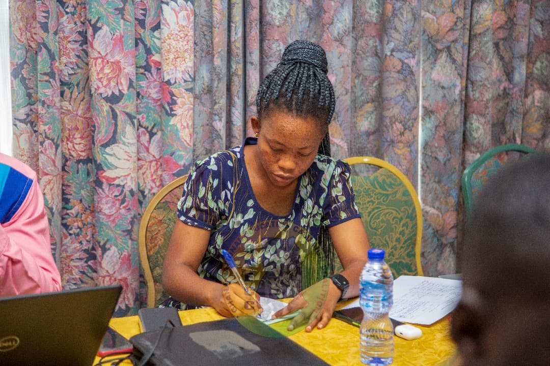 Lawrencia Owusu working on grants